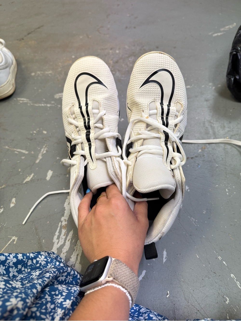 Nike White Cleats with Black Swoosh Accents